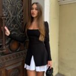 470239069_17907197637066125_8776229450520694081_n Juoda mini suknelė su balta klostuota apačia